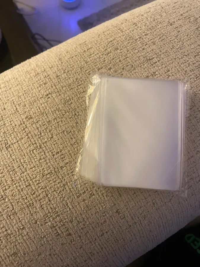 Buyer photo from a verified 100 sleeves pack order